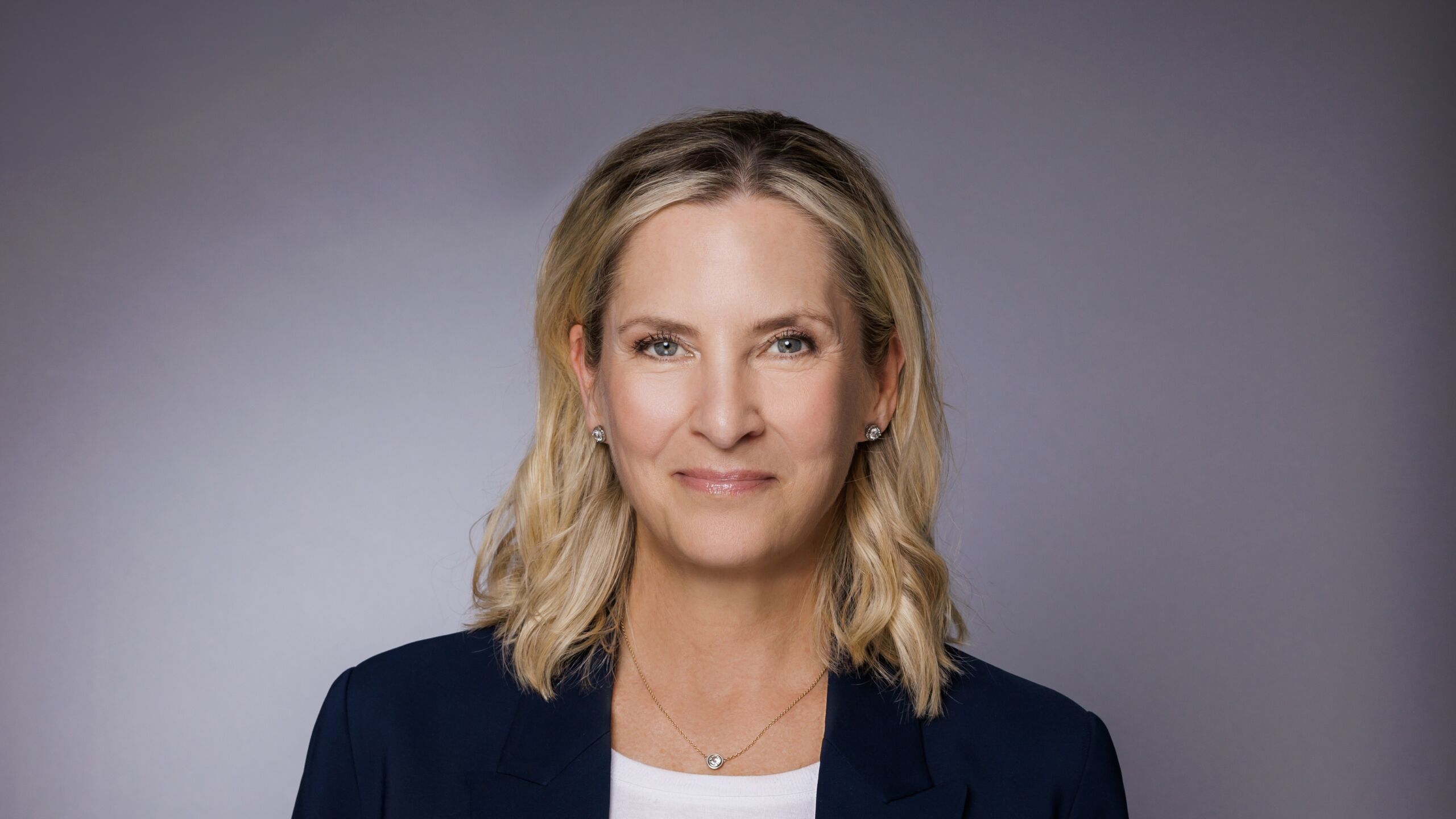 Sasha Bühler, Prime Video’s incoming head of German originals, in a navy blazer against a grey backdrop